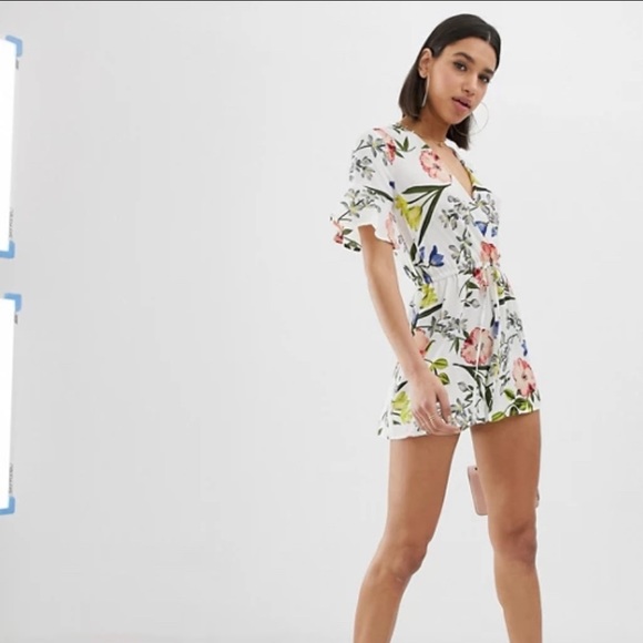 AX Paris Dresses & Skirts - AX Paris floral wrap romper